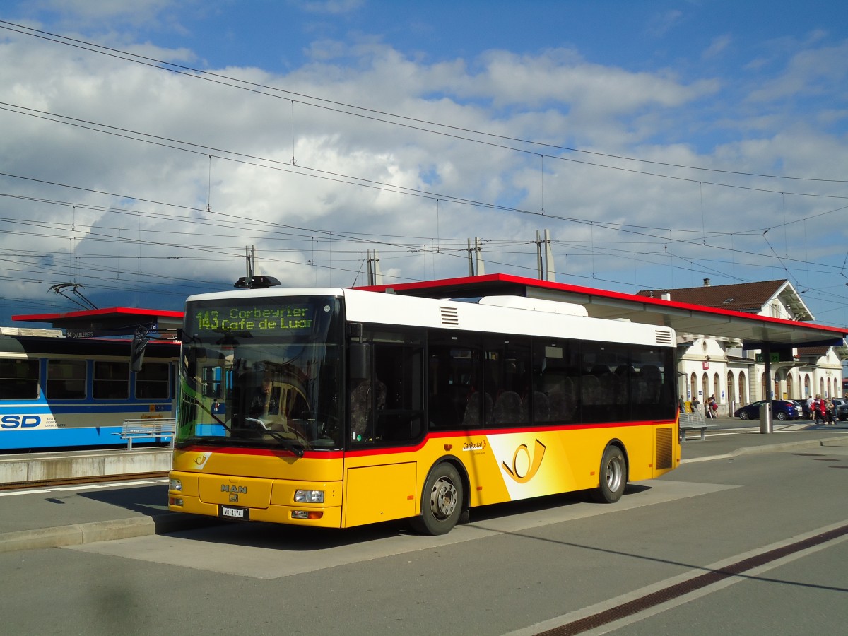 (145'316) - TPC Aigle - VD 1174 - MAN/Gppel am 22. Juni 2013 beim Bahnhof Aigle