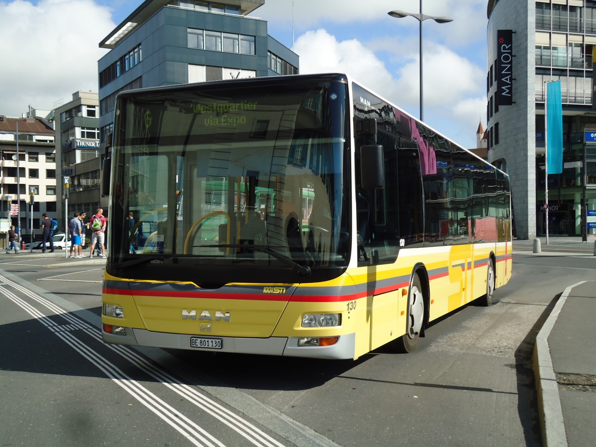 (145'517) - STI Thun - Nr. 130/BE 801'130 - MAN am 30. Juni 2013 beim Bahnhof Thun