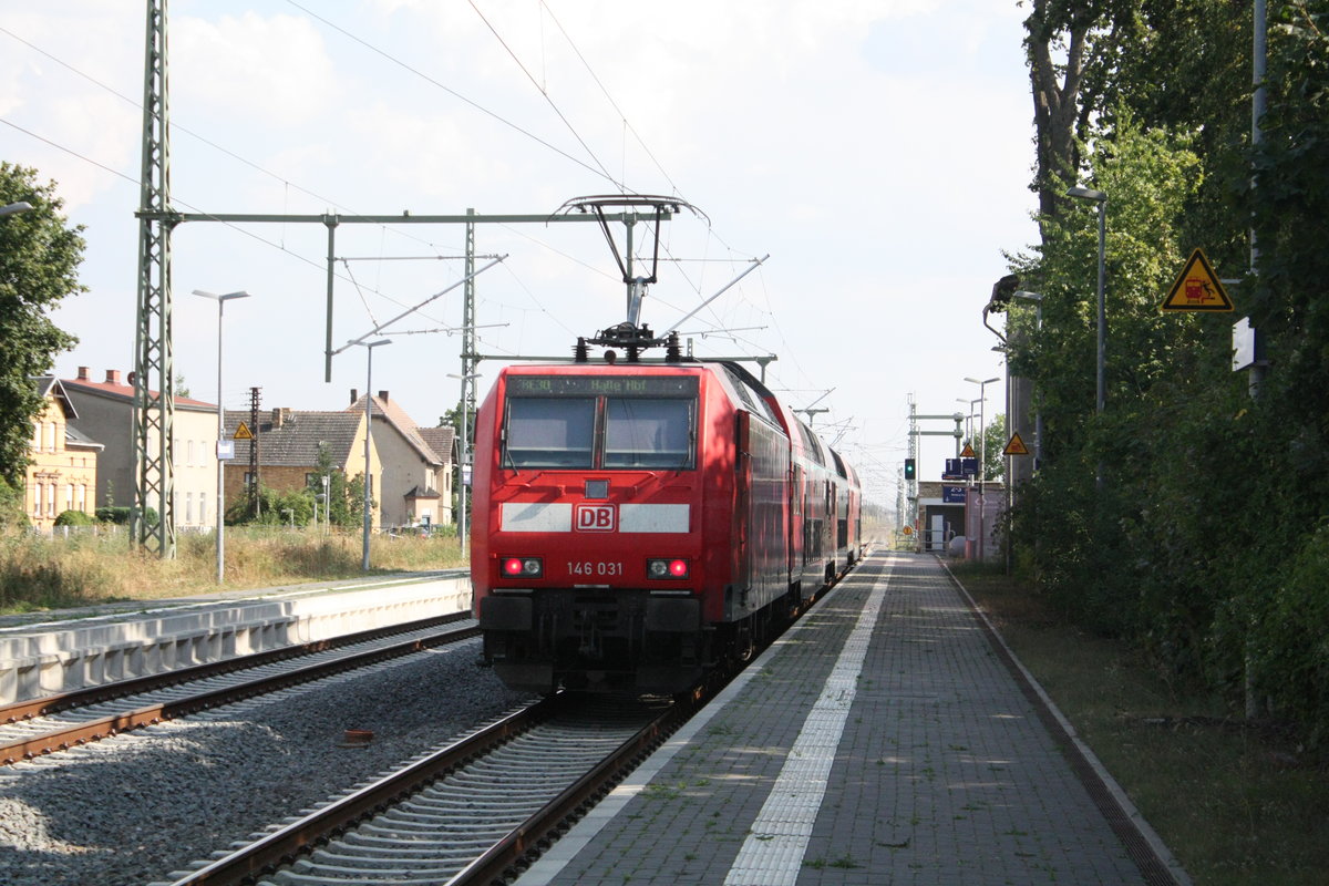 146 031 mit dem RE30 mit ziel Halle/Saale Hbf im Bahnhof Stumsdorf am 11.8.20