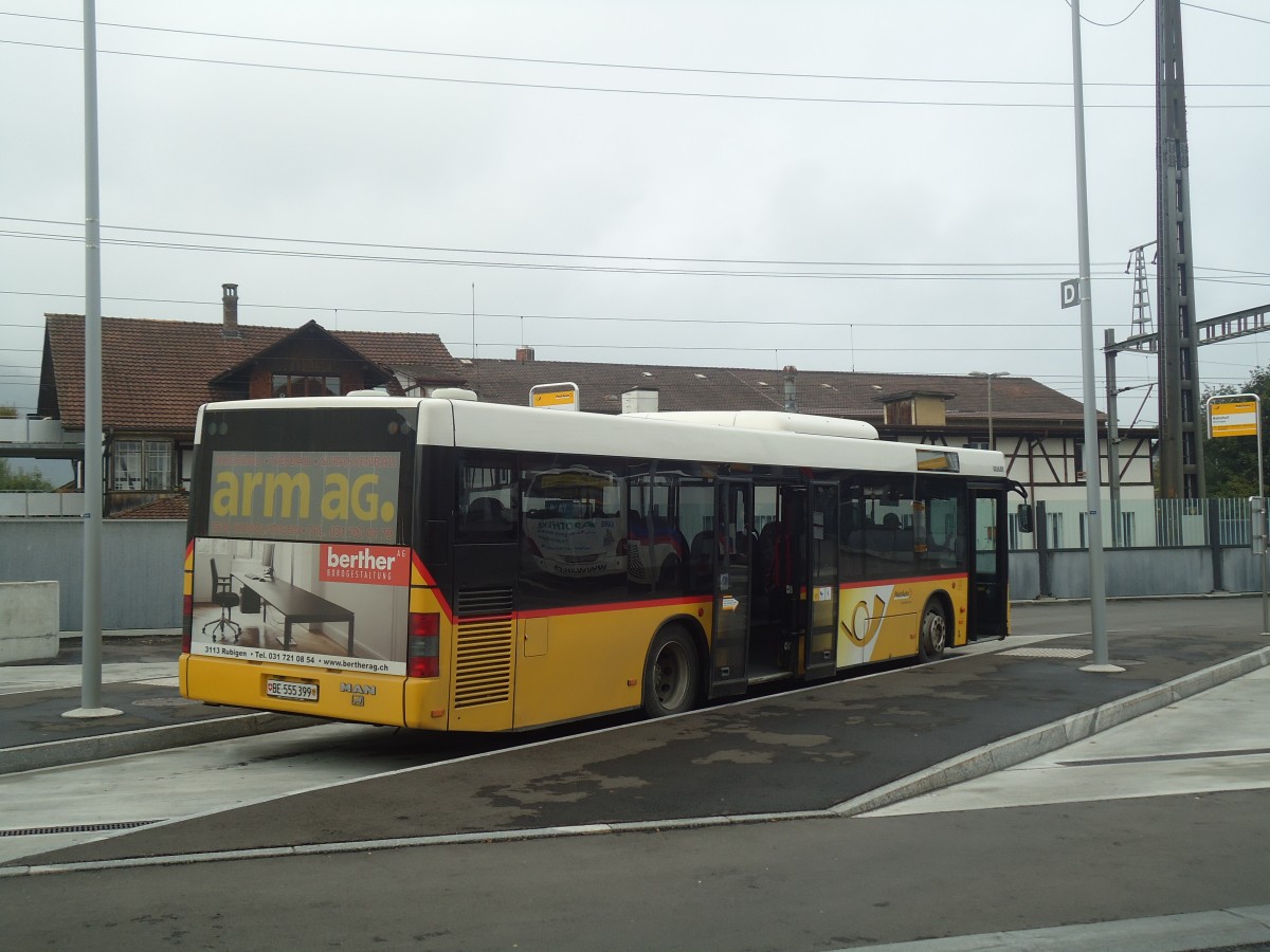 (147'432) - Lengacher, Mnsingen - Nr. 1/BE 555'399 - MAN am 30. September 2013 beim Bahnhof Mnsingen