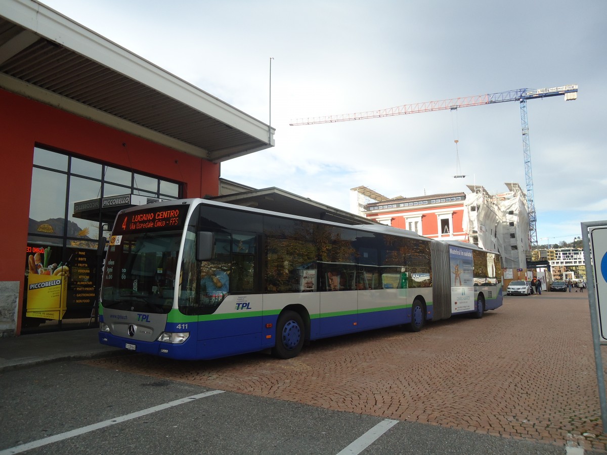 (147'685) - TPL Lugano - Nr. 411/TI 139'643 - Mercedes am 5. November 2013 beim Bahnhof Lugano