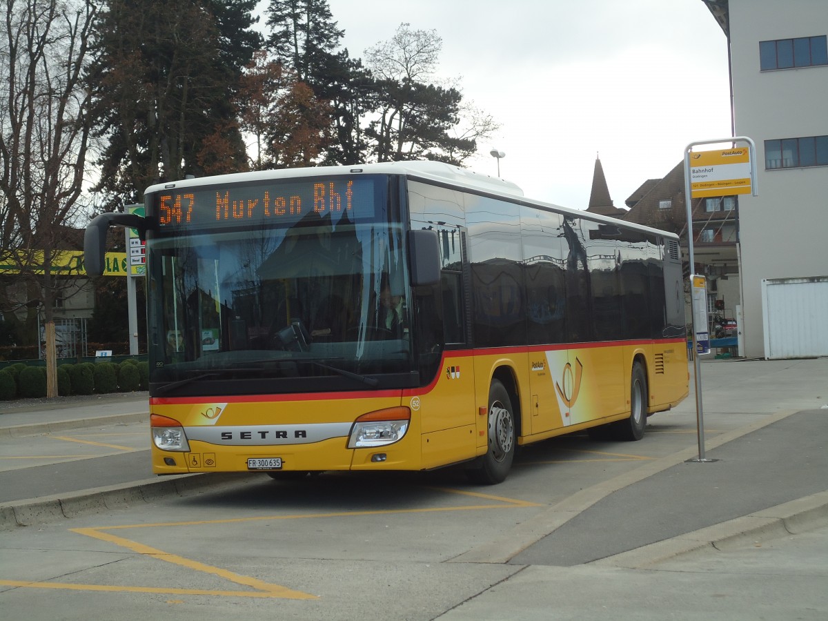 (148'168) - Wieland, Murten - Nr. 52/FR 300'635 - Setra am 25. November 2013 beim Bahnhof Ddingen