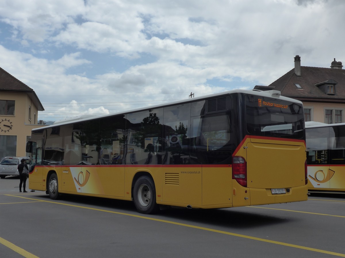 (151'052) - CarPostal Ouest - Nr. 23/JU 59'239 - Setra am 29. Mai 2014 in Delmont, Place de la Poste