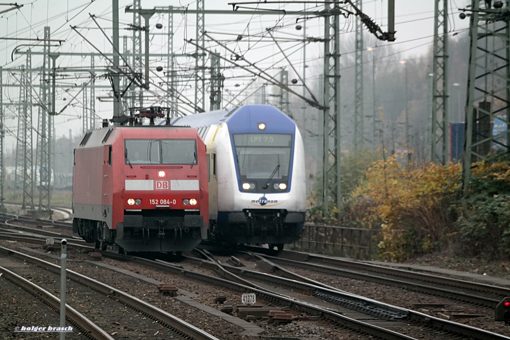 152 084-0 begegnet einen metronom am 15.11.13 in hh-harburg