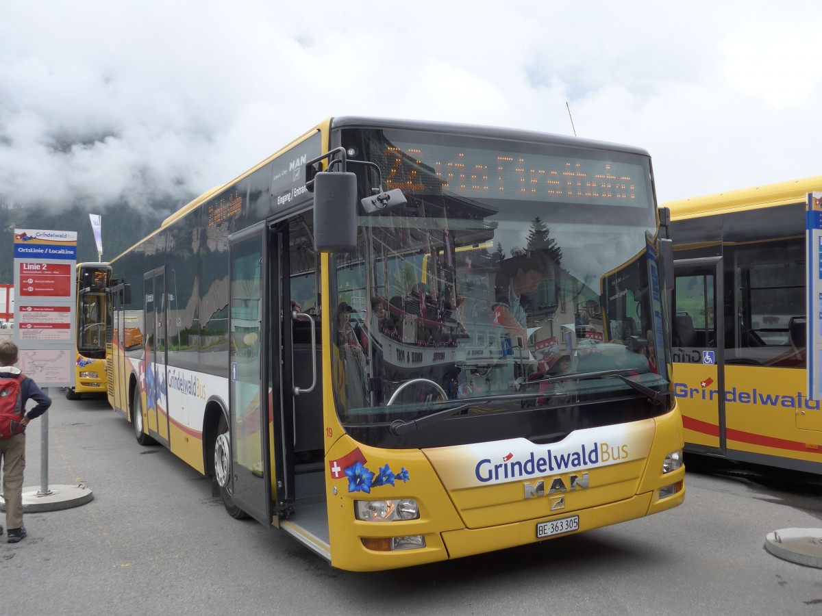 (153'549) - AVG Grindelwald - Nr. 19/BE 363'305 - MAN/Gppel am 3. August 2014 beim Bahnhof Grindelwald