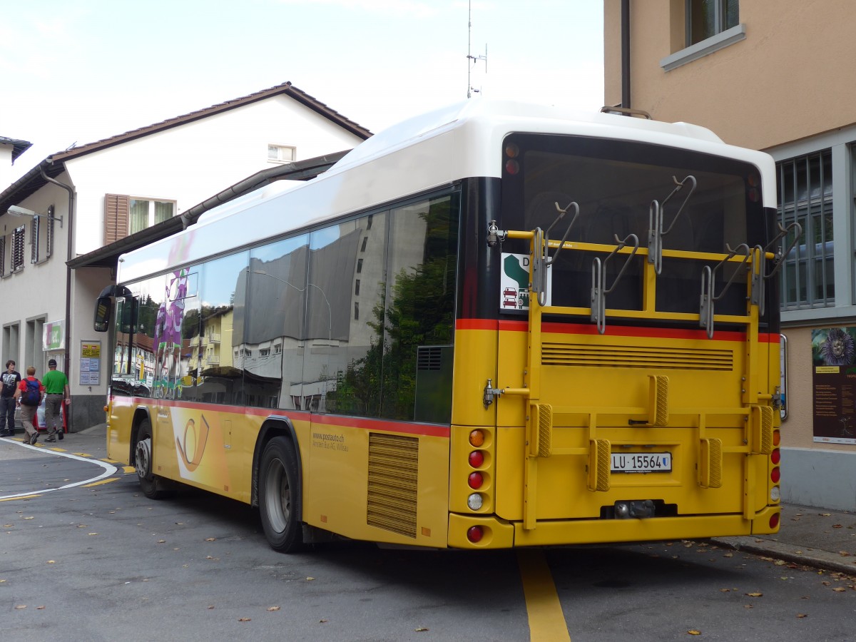 (154'645) - Amstein, Willisau - Nr. 24/LU 15'564 - Scania/Hess am 30. August 2014 beim Bahnhof Wolhusen