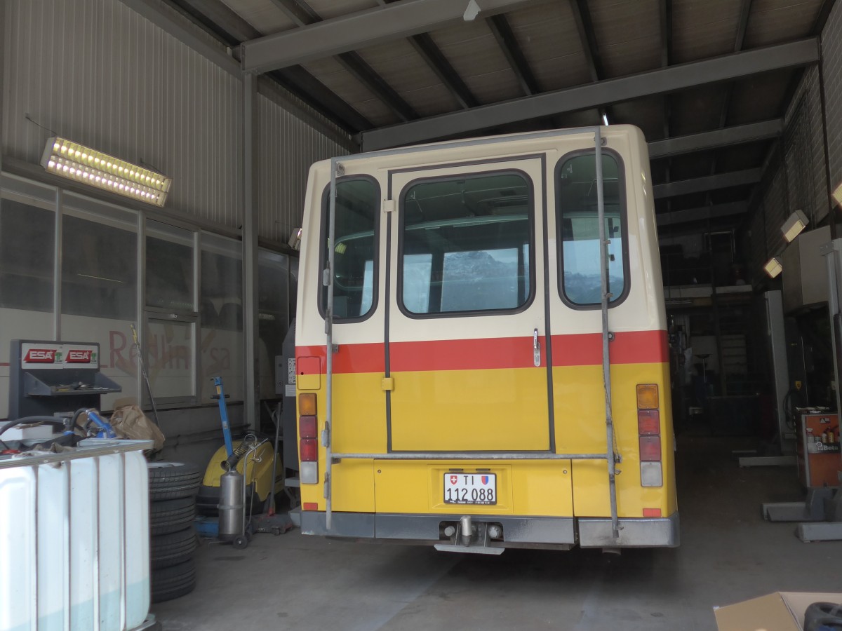 (154'795) - Marchetti, Airolo - TI 112'088 - NAW/Hess (ex PostAuto Bern; ex AVG Meiringen Nr. 66; ex P 24'452) am 1. September 2014 in Airolo, Garage