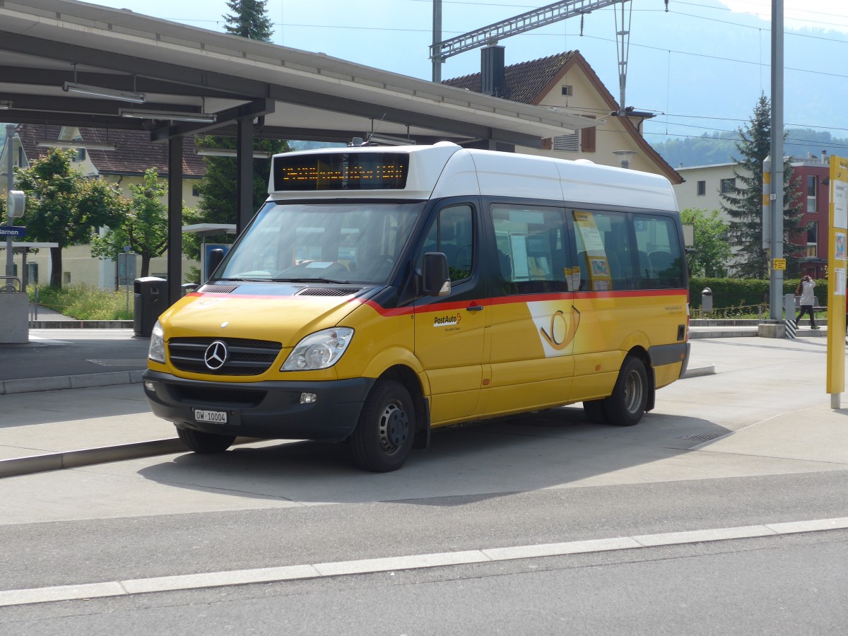 (160'912) - Dillier, Sarnen - Nr. 15/OW 10'004 - Mercedes am 24. Mai 2015 beim Bahnhof Sarnen