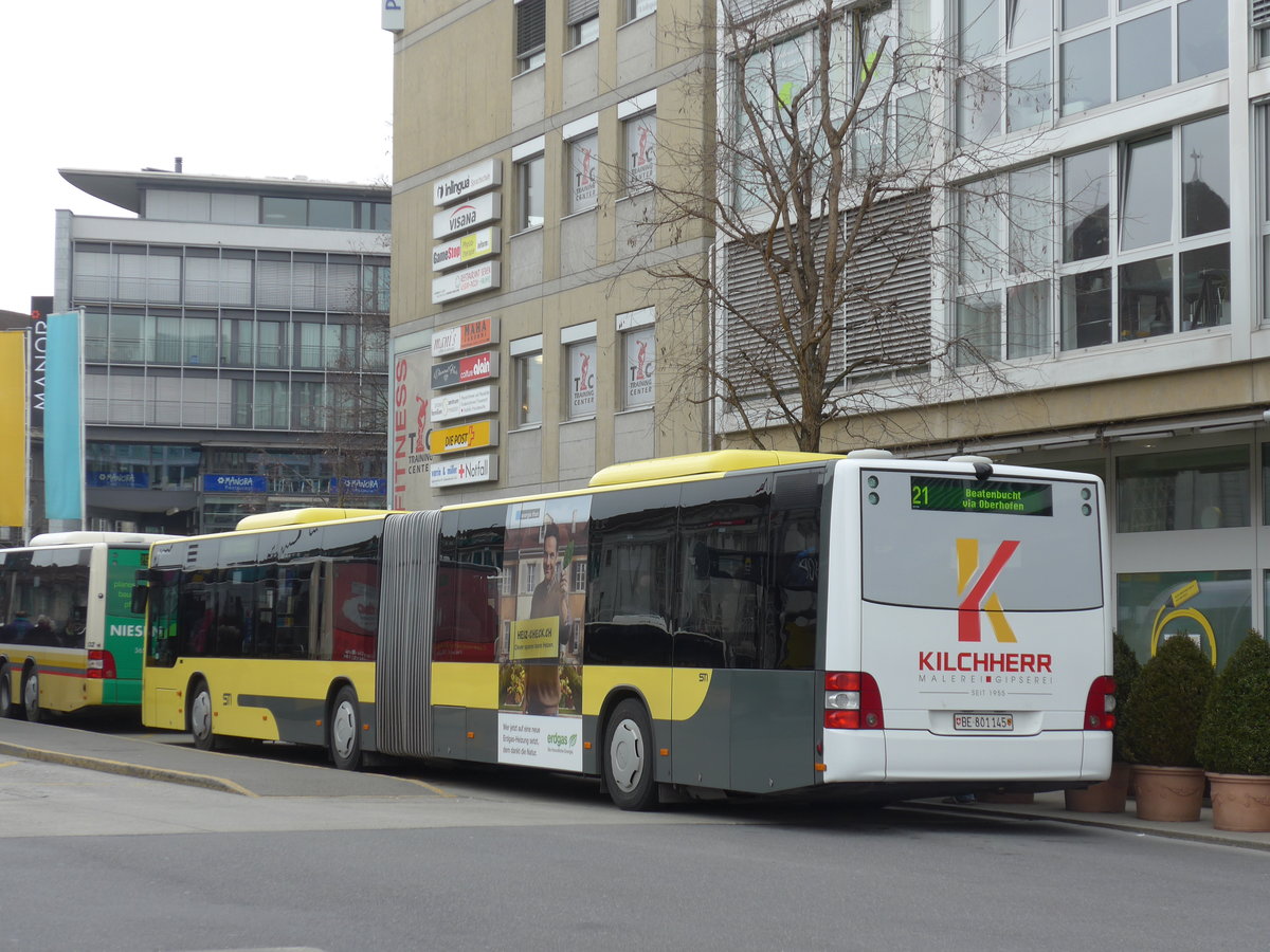 (169'226) - STI Thun - Nr. 145/BE 801'145 - MAN am 13. Mrz 2016 beim Bahnhof Thun