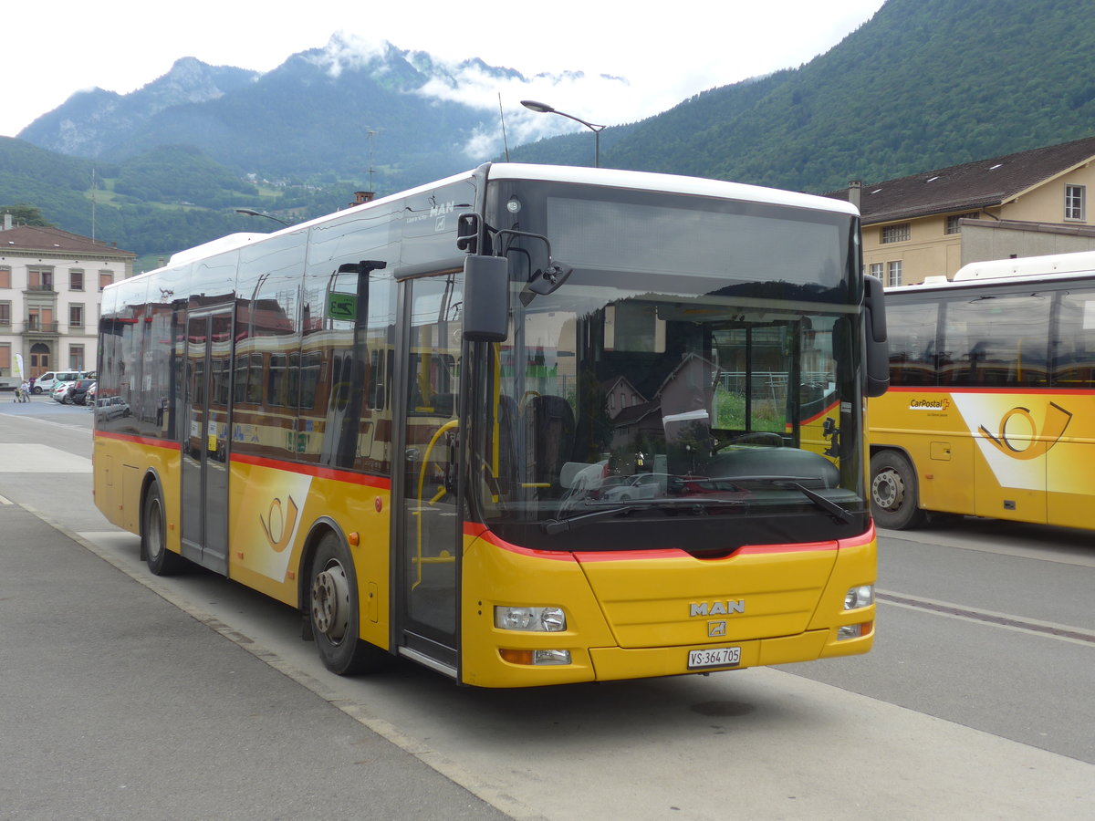 (172'113) - TPC Aigle - VS 364'705 - MAN/Gppel (ex Evasion, St-Maurice) am 25. Juni 2016 beim Bahnhof Aigle