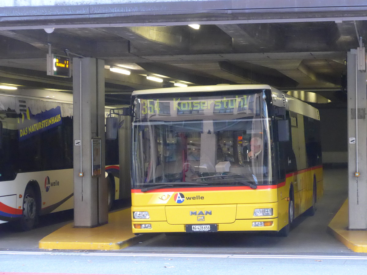 (176'262) - PostAuto Nordschweiz - AG 428'656 - MAN am 22. Oktober 2016 in Baden, Postautostation