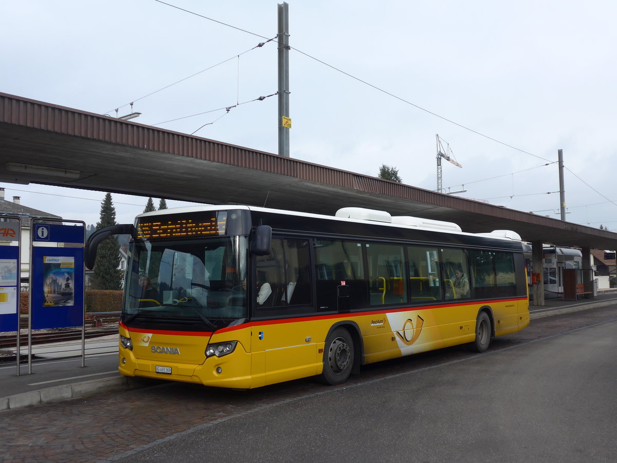 (177'312) - PostAuto Nordschweiz - AG 493'369 - Scania am 24. Dezember 2016 beim Bahnhof Schftland