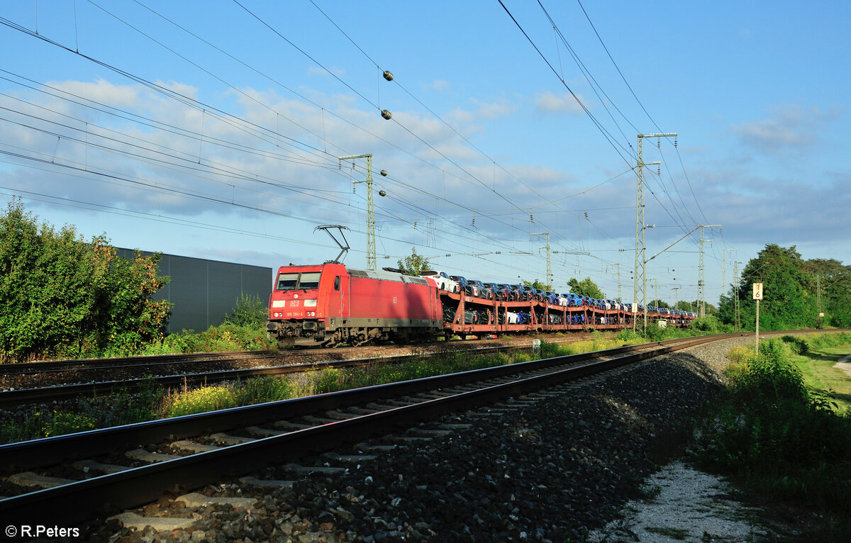 185 394-4 mit einem Autotransportzug in Nürnberg Hohe Marta. 27.09.23