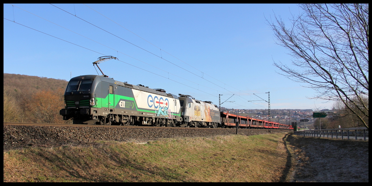 193 225 mit 182 523 und einem leeren Autozug am 11.03.17 bei Wernfeld