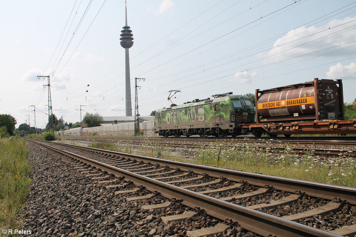 193 234  Grüner Offroad  zieht mit einem KLV Zug durch Nürnberg Hohe Marter. 24.07.24