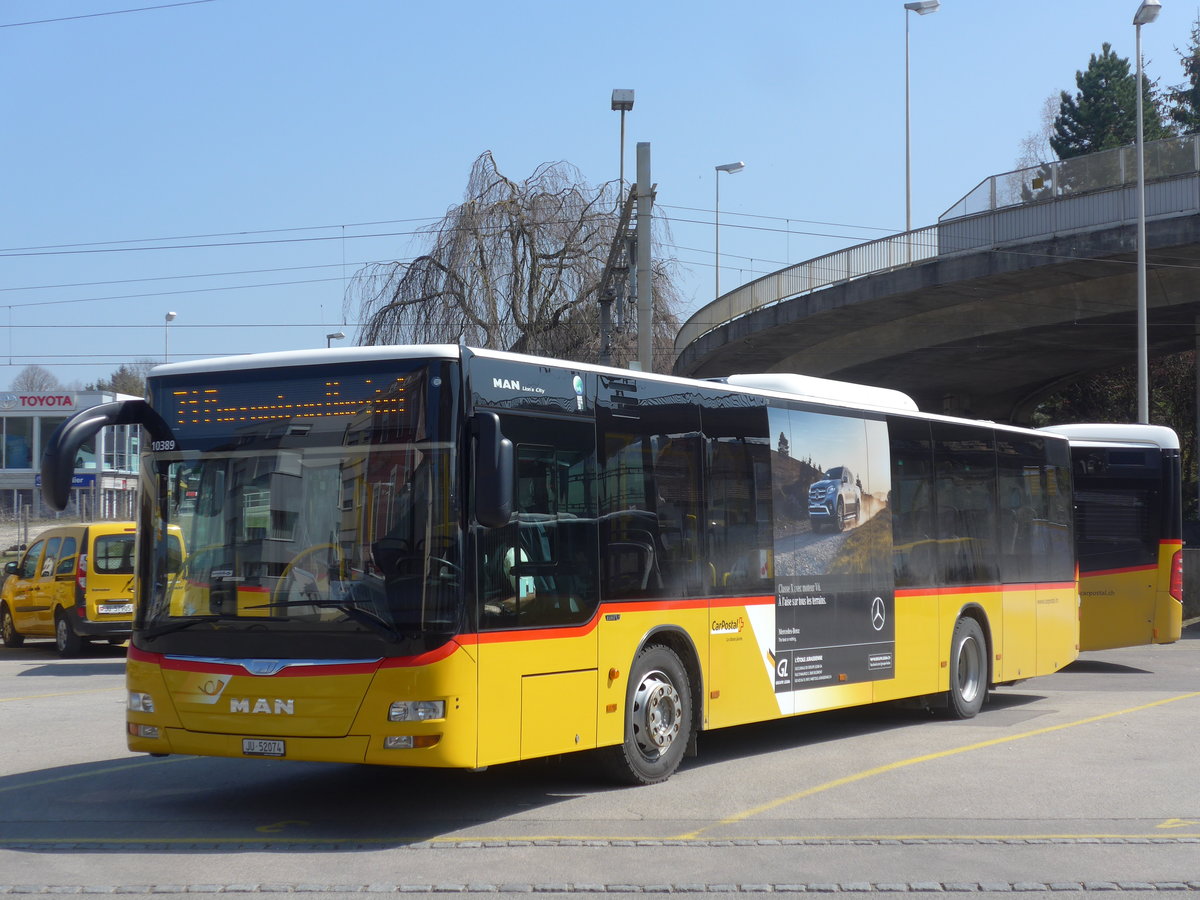 (203'730) - CarPostal Ouest - JU 52'074 - MAN (ex Nr. 62) am 15. April 2019 beim Bahnhof Porrentruy