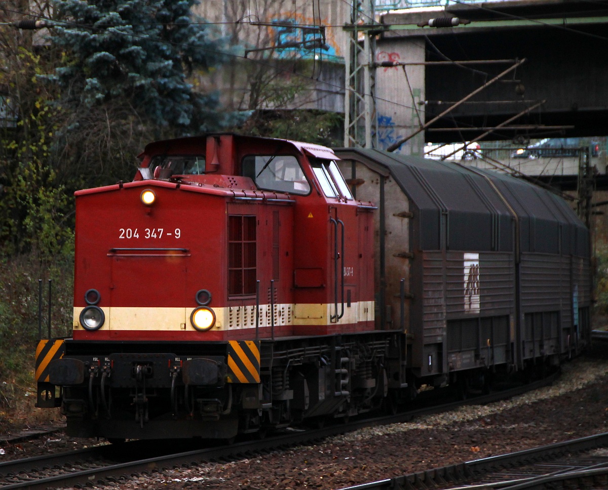 204 347-9(98 80 3202 347-1 D-MTEG, LEW 1971/12856, V100.1, 1082 kW, ex ALS, DR 202 347)kommt hier mit einem ARS/PCT Zug durch HH-Harburg gedieselt. 30.11.2013