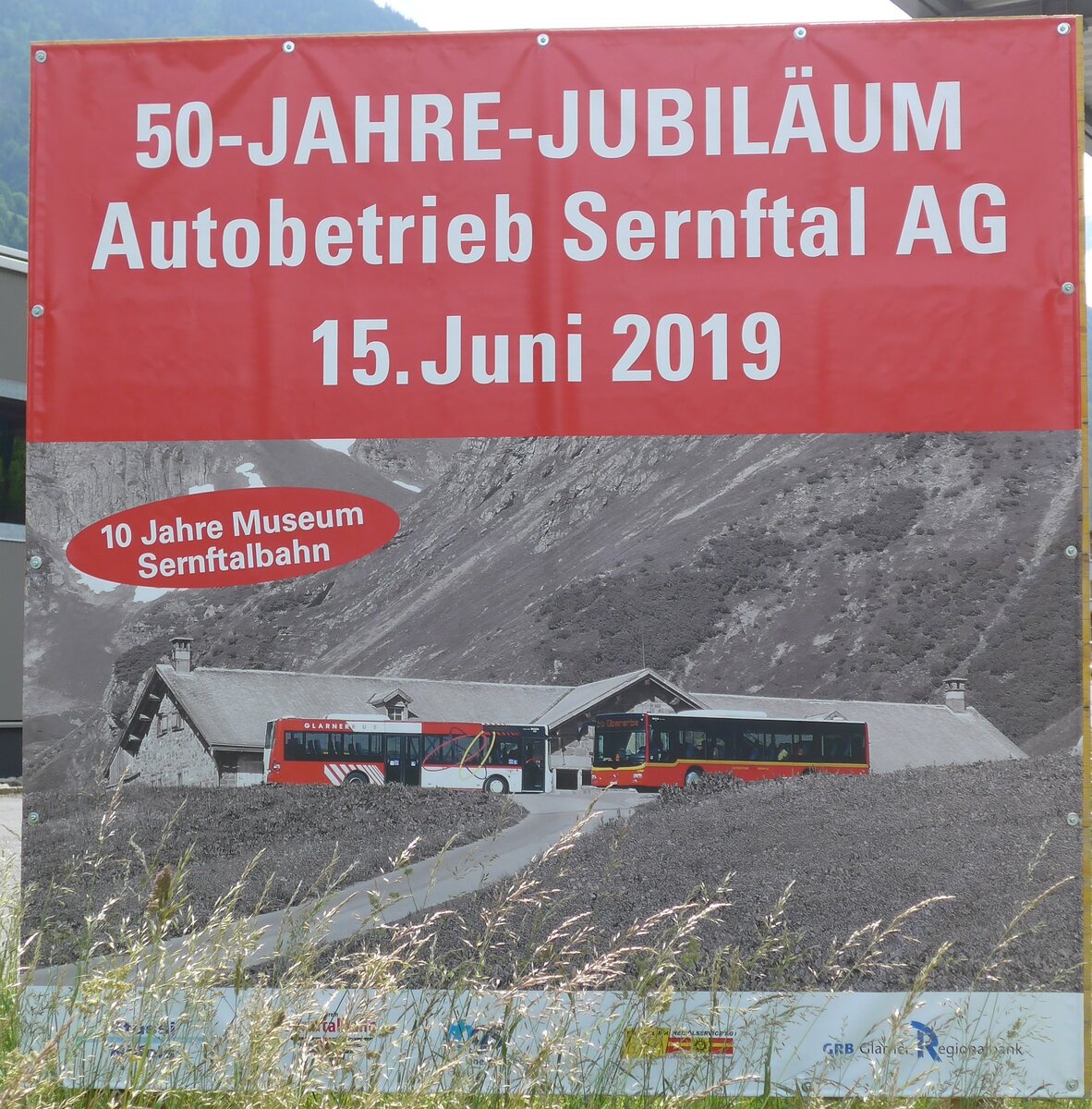 (206'334) - Plakat fr 50-JAHRE-JUBILUM Autobetrieb Sernftal AG am 15. Juni 2019 in Engi, Garage