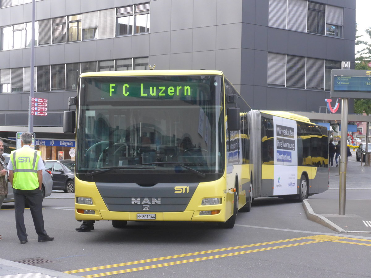 (209'888) - STI Thun - Nr. 144/BE 801'144 - MAN am 5. Oktober 2019 beim Bahnhof Thun