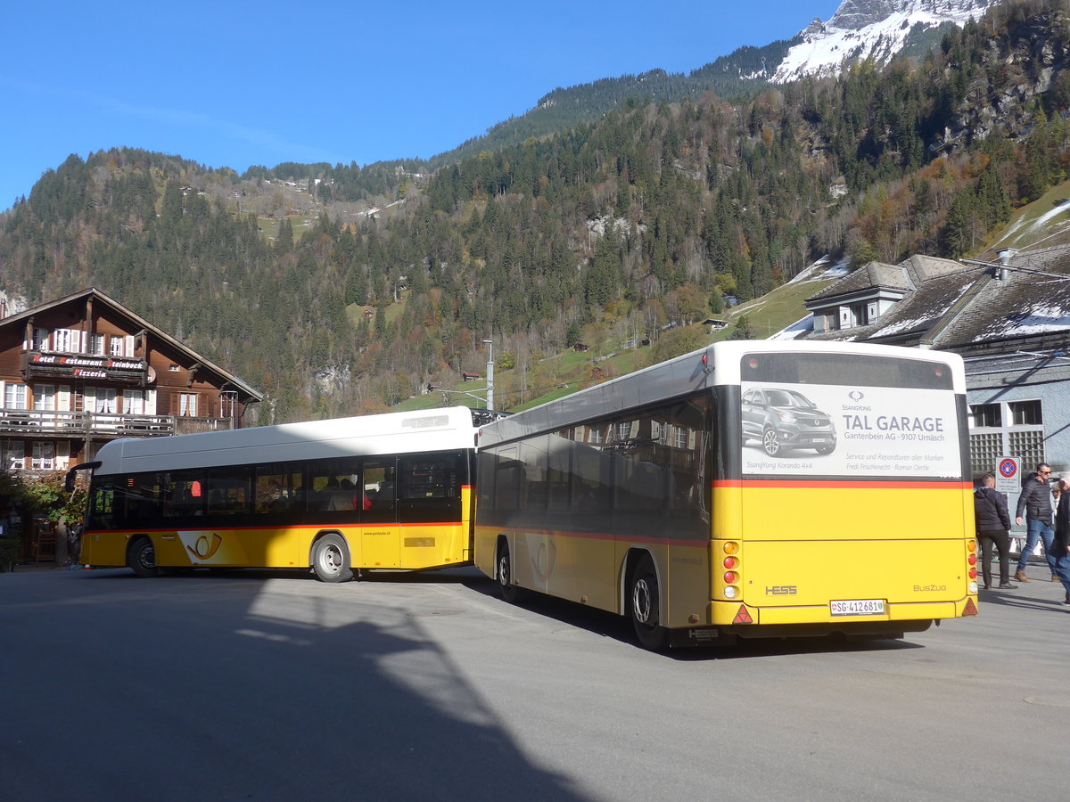 (211'016) - PostAuto Ostschweiz - SG 426'001 - Hess + SG 412'681 - Hess Personenanhnger am 11. November 2019 beim Bahnhof Lauterbrunnen