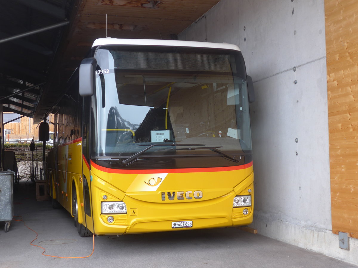 (215'129) - PostAuto Bern - BE 487'695 - Iveco am 14. Mrz 2020 in Gstaad, Garage Kbli