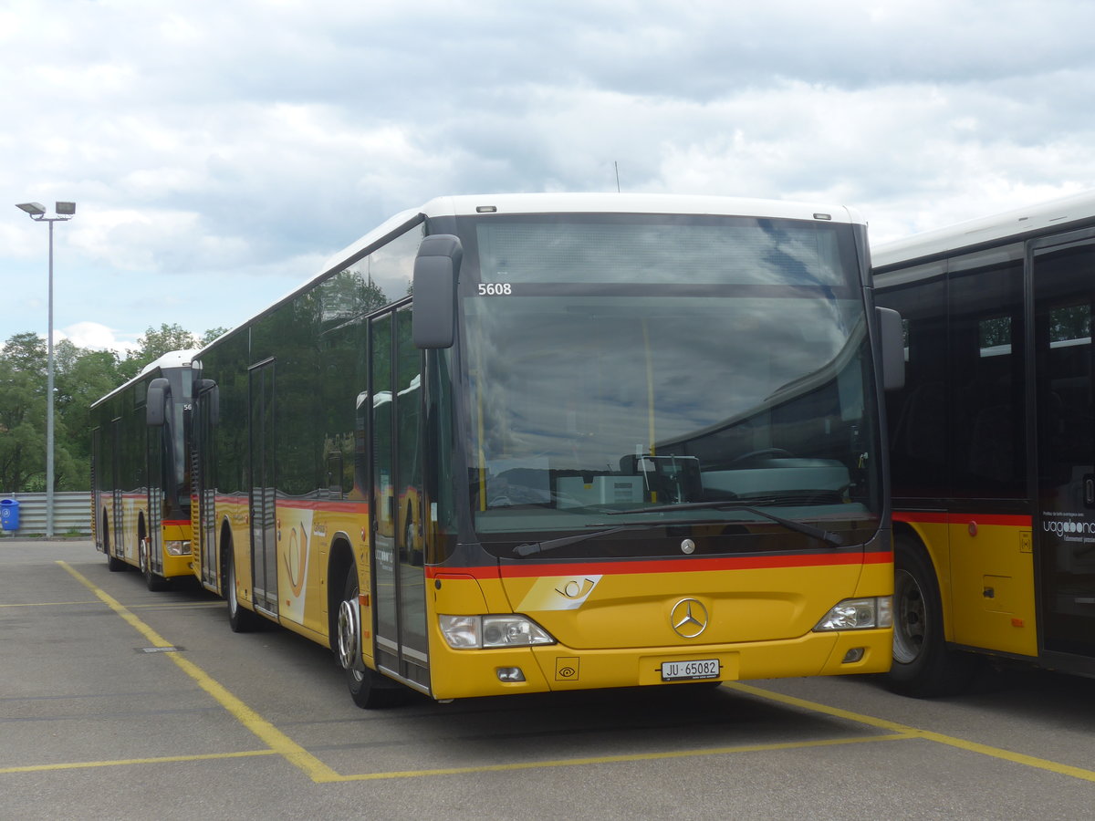 (216'947) - CarPostal Ouest - JU 65'082 - Mercedes (ex Nr. 15) am 10. Mai 2020 in Develier, Parkplatz