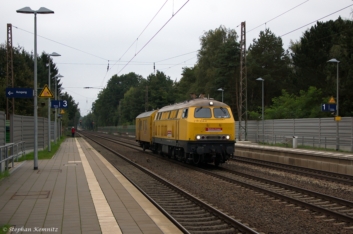 218 304-4 Deutsche Bahn Gleisbau GmbH mit einem Waggon in Bienenbüttel und fuhr weiter in Richtung Uelzen. 13.09.2014