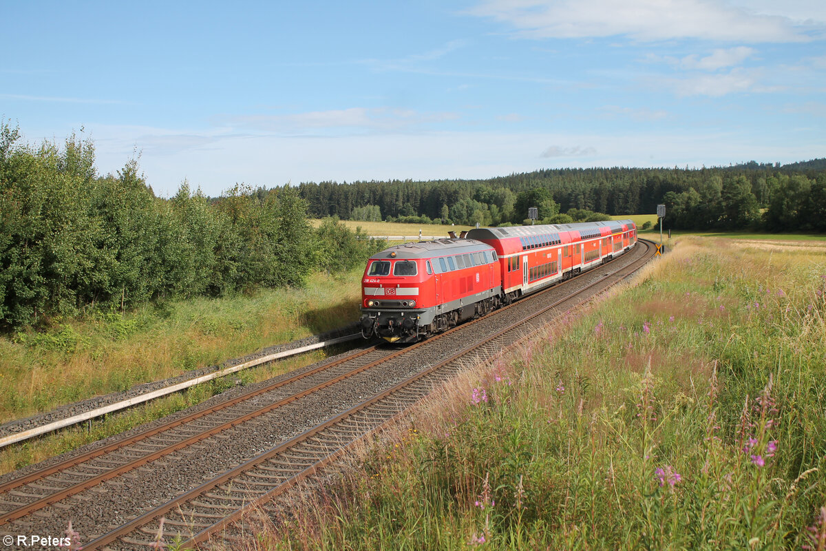 218 424-0 zieht bei Growendern den RE2 RE4859 Hof - Mnchen. 07.07.24