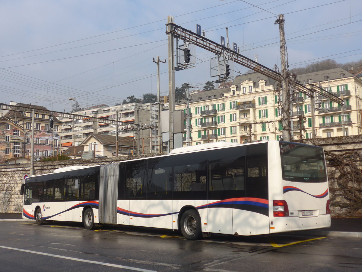 (223'999) - PostAuto Nordschweiz - NE 165'371 - MAN (ex AG 271'181) am 7. Mrz 2021 beim Bahnhof Neuchtel