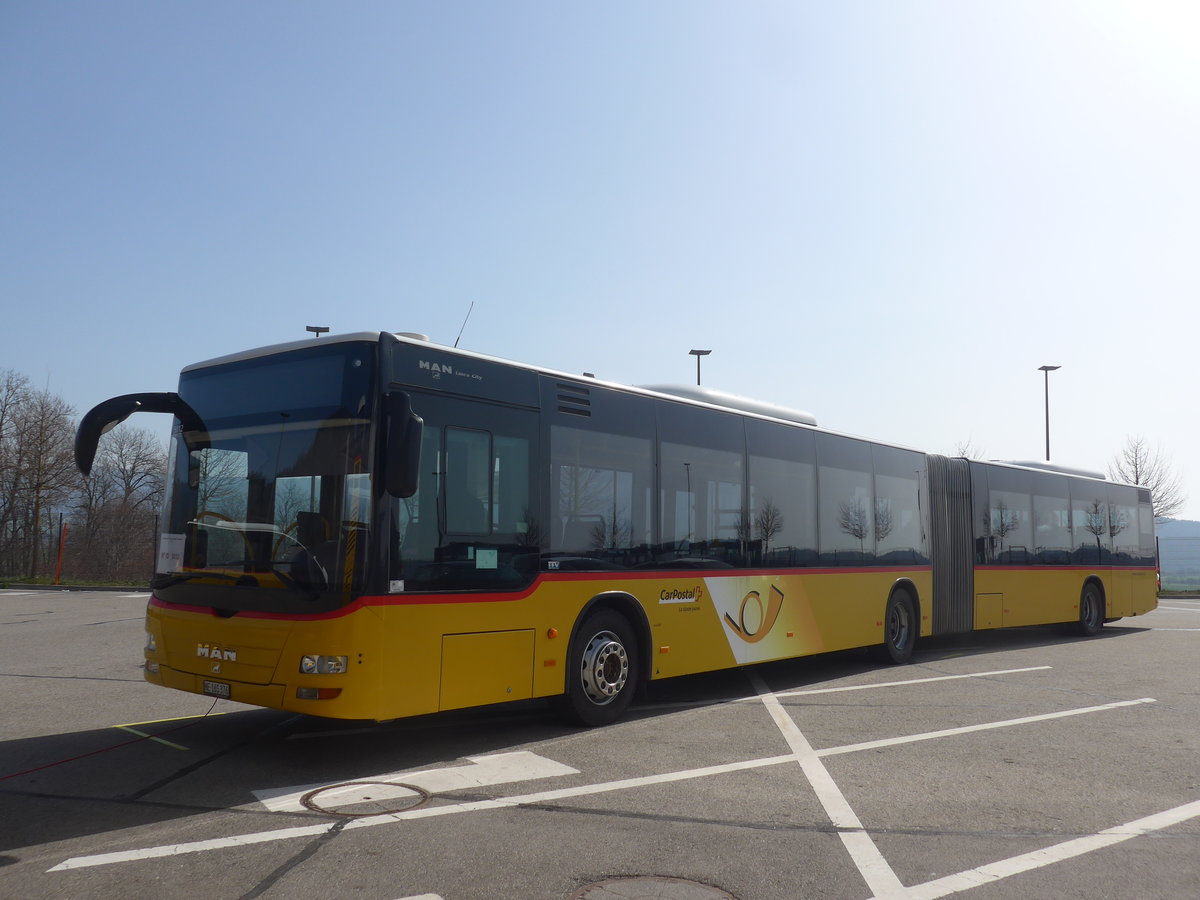 (224'686) - CarPostal Ouest - NE 165'376 - MAN (ex VD 495'042) am 2. April 2021 in Boudevilliers, SCAN-ne