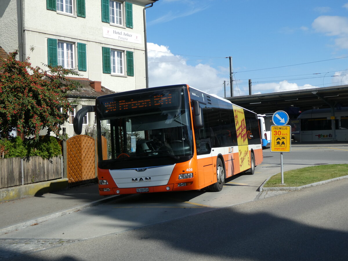 (229'118) - AOT Amriswil - Nr. 406/TG 180'556 - MAN (ex Nr. 2) am 13. Oktober 2021 beim Bahnhof Romanshorn