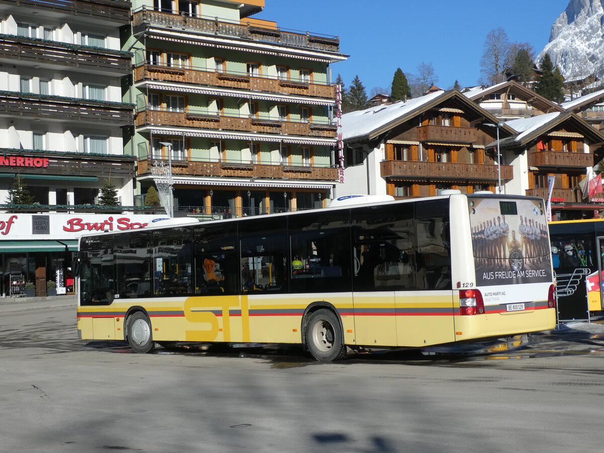 (232'891) - STI Thun - Nr. 129/BE 800'129 - MAN am 13. Februar 2022 beim Bahnhof Grindelwald