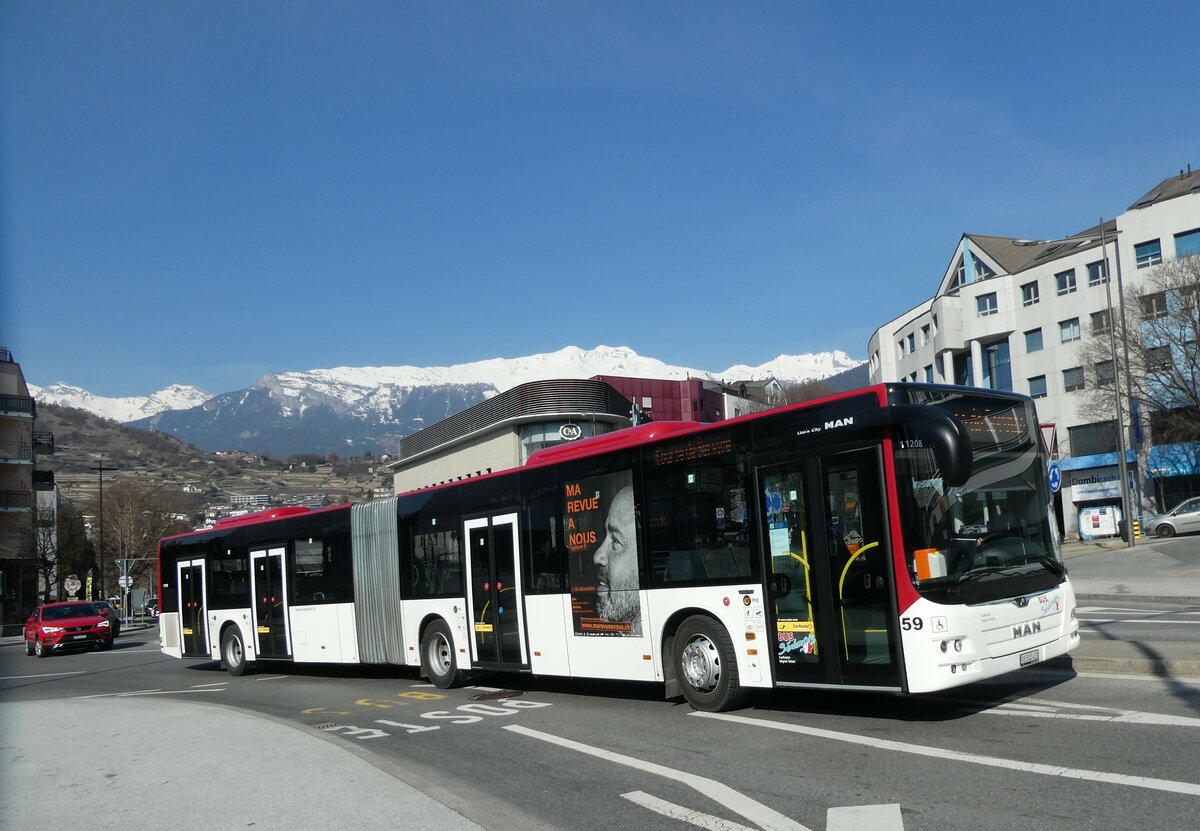 (233'408) - PostAuto Wallis - Nr. 59/VS 500'433 - MAN am 7. Mrz 2022 beim Bahnhof Sion