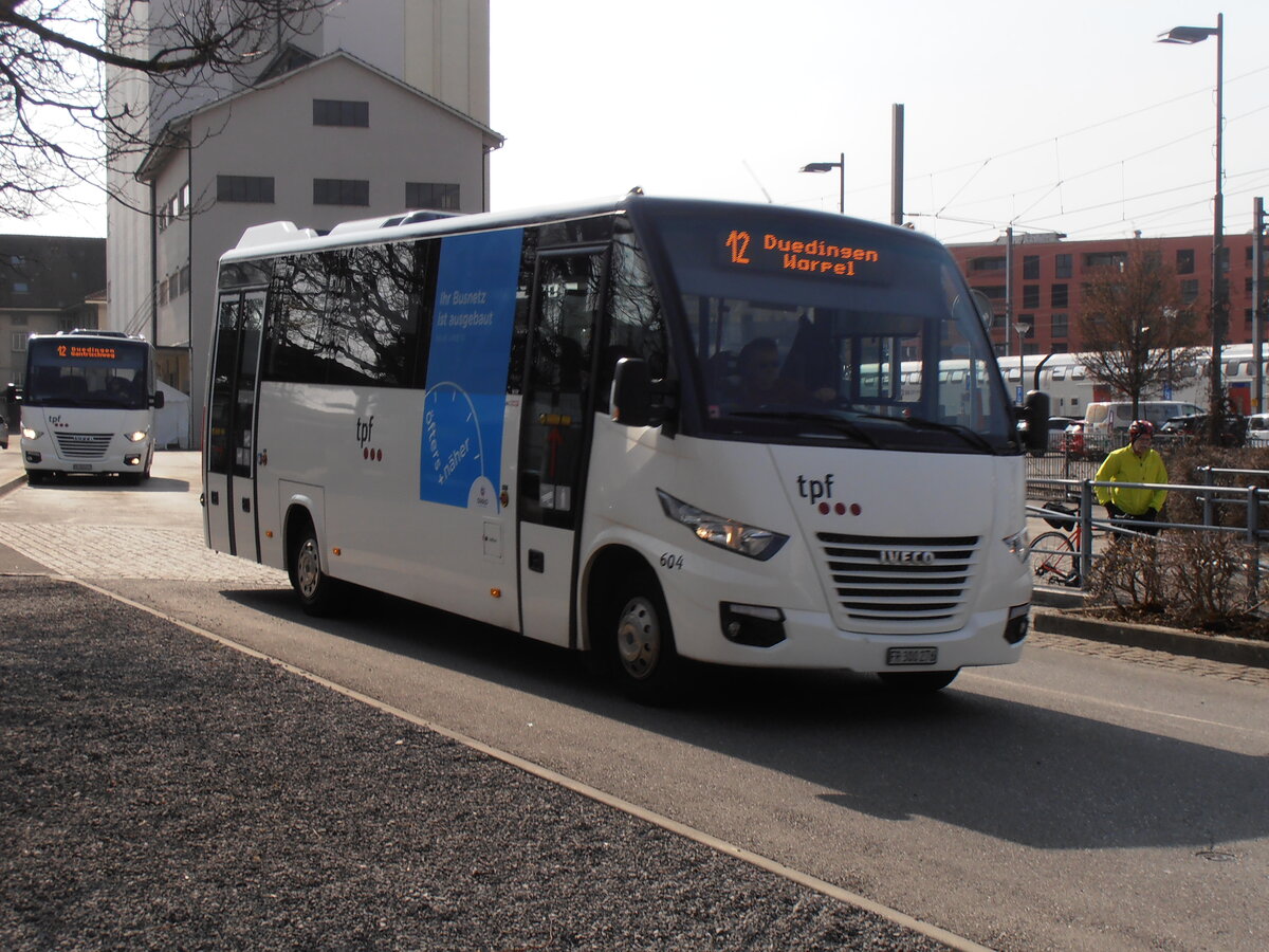 (233'834) - TPF Fribourg - Nr. 604/FR 300'276 - Iveco/ProBus am 12. Mrz 2022 beim Bahnhof Ddingen