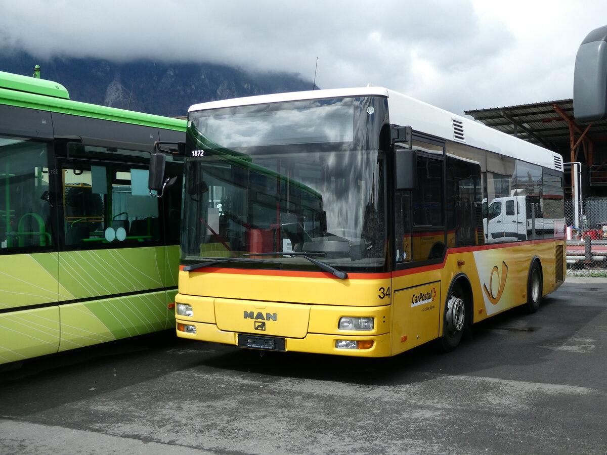 (234'285) - MOB Montreux - Nr. 34 - MAN/Gppel (ex TSAR, Sierre; ex PostAuto Bern; ex P 23'032) am 9. April 2022 in Collombey, Garage TPC