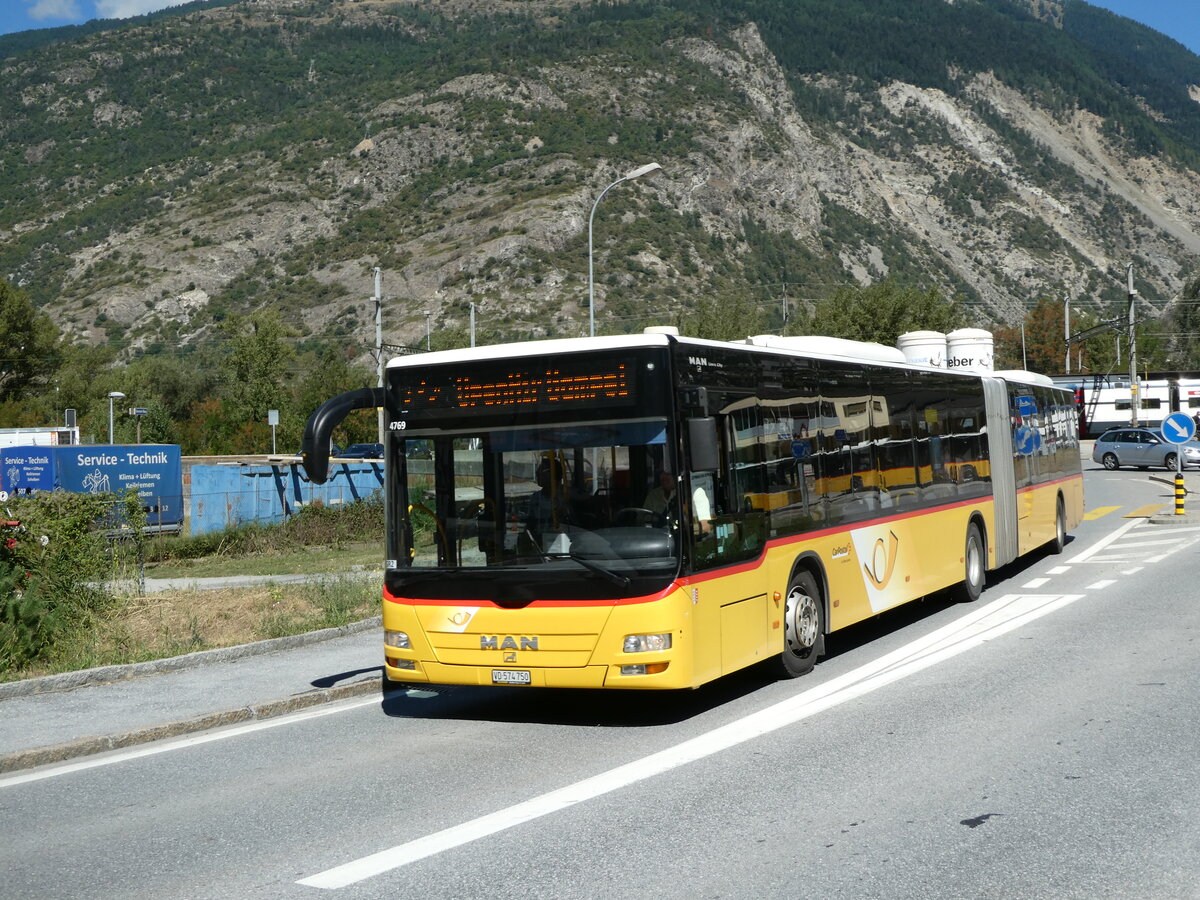 (239'367) - SEFA, Aubonne - VD 574'750 - MAN (ex CarPostal Ouest; ex Buchard, Leytron; ex Buchard, Leytron Nr. 161) am 21. August 2022 beim Bahnhof Gampel-Steg