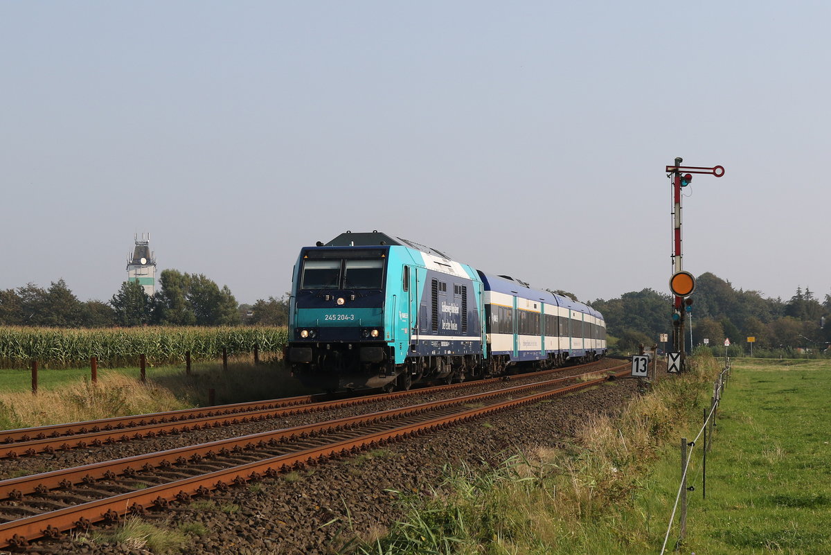 245 204 war am 28. August 2019 bei Risum-Lindholm mit einem Regionalzug in Richtung Sylt unterwegs.