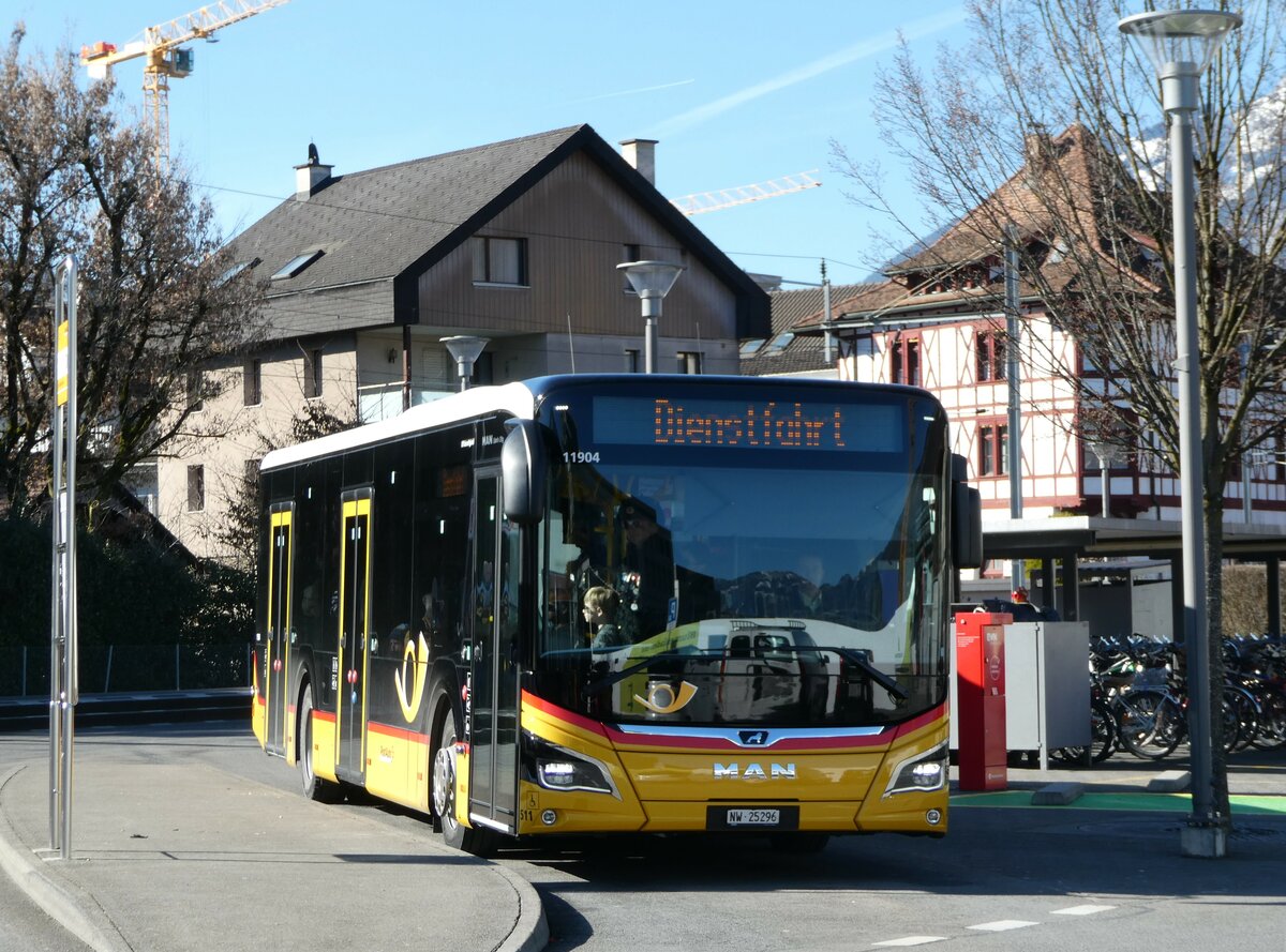 (246'161) - PostAuto Zentralschweiz - Nr. 511/NW 25'296/PID 11'904 - MAN am 16. Februar 2023 beim Bahnhof Stans