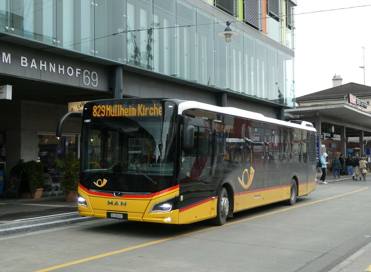 (246'595) - PostAuto Ostschweiz - TG 158'217/PID 11'897 - MAN am 25. Februar 2023 beim Bahnhof Frauenfeld