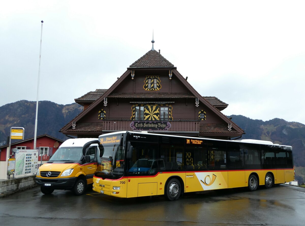 (247'110) - PostAuto Zentralschweiz - Nr. 700/NW 27'617/PID 5569 - MAN (ex Niederer, Filzbach Nr. 12; ex PostAuto Ostschweiz) am 10. Mrz 2023 beim Bahnhof Seelisberg