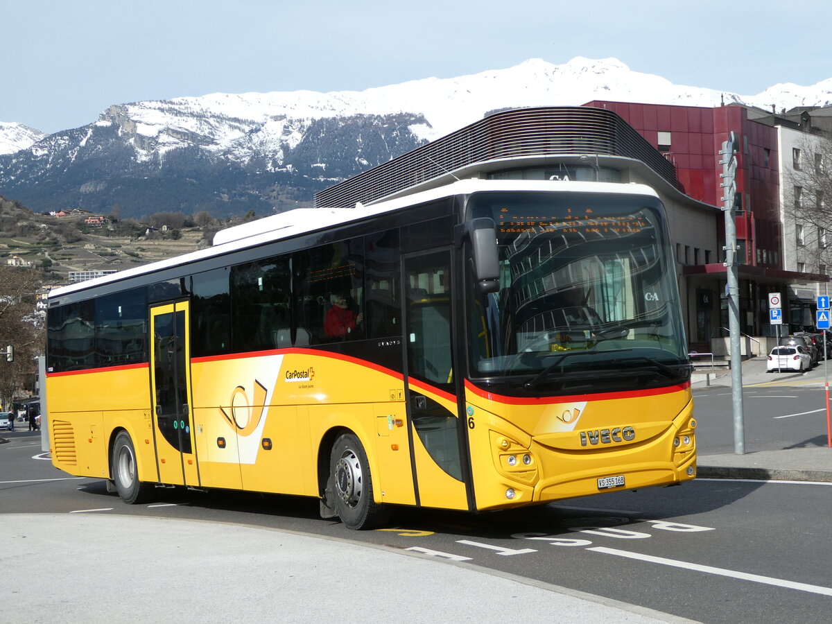 (247'242) - PostAuto Wallis - Nr. 6/VS 355'168/PID 11'763 - Iveco am 16. Mrz 2023 beim Bahnhof Sion