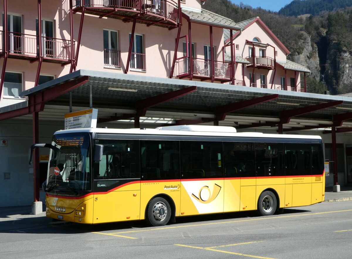 (247'412) - Flck, Brienz - Nr. 26/BE 868'726/PID 11'668 - Iveco am 18. Mrz 2023 in Meiringen, Postautostation