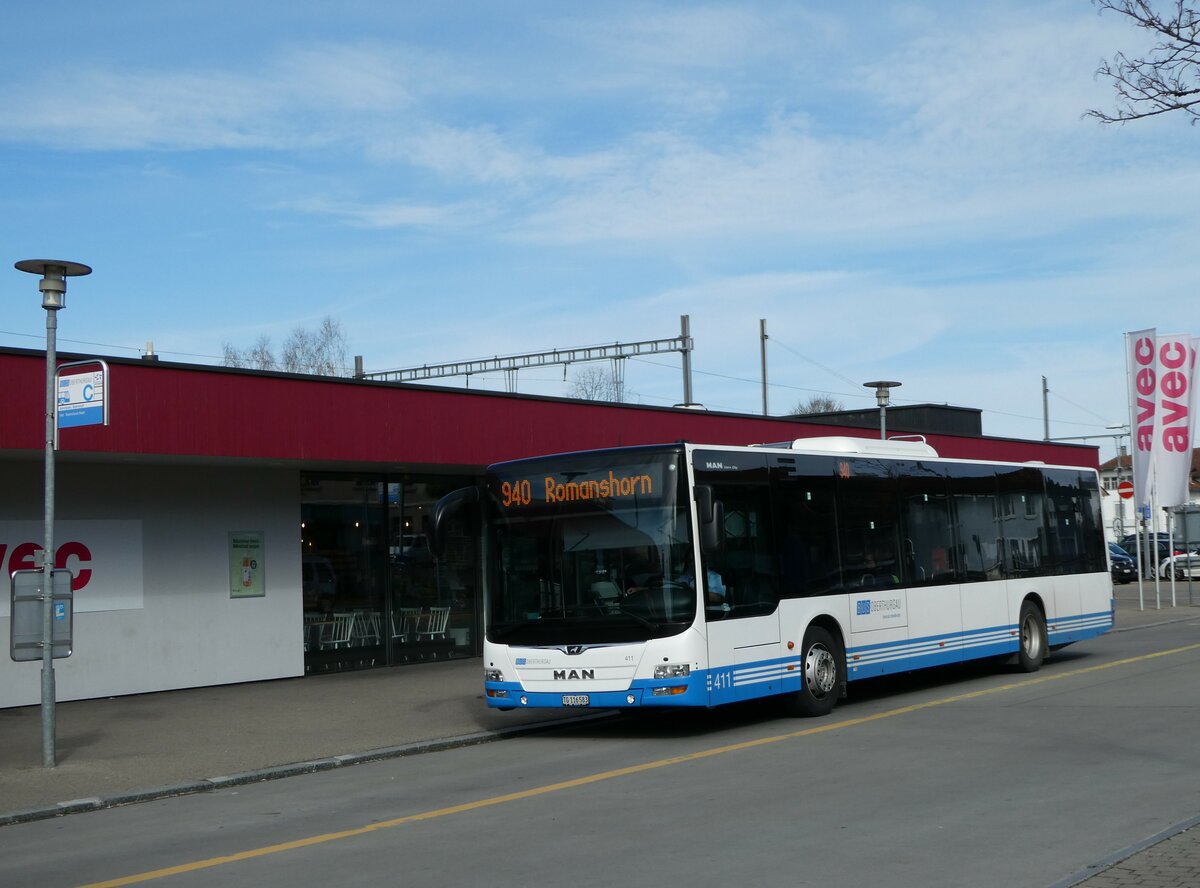 (247'818) - BOTG Amriswil - Nr. 411/TG 116'583 - MAN am 28. Mrz 2023 beim Bahnhof Amriswil