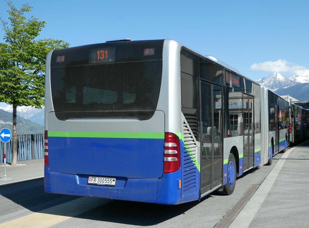 (249'497) - Intertours, Domdidier - Nr. 412/FR 300'555 - Mercedes (ex TPL Lugano Nr. 412) am 3. Mai 2023 beim Bahnhof Spiez