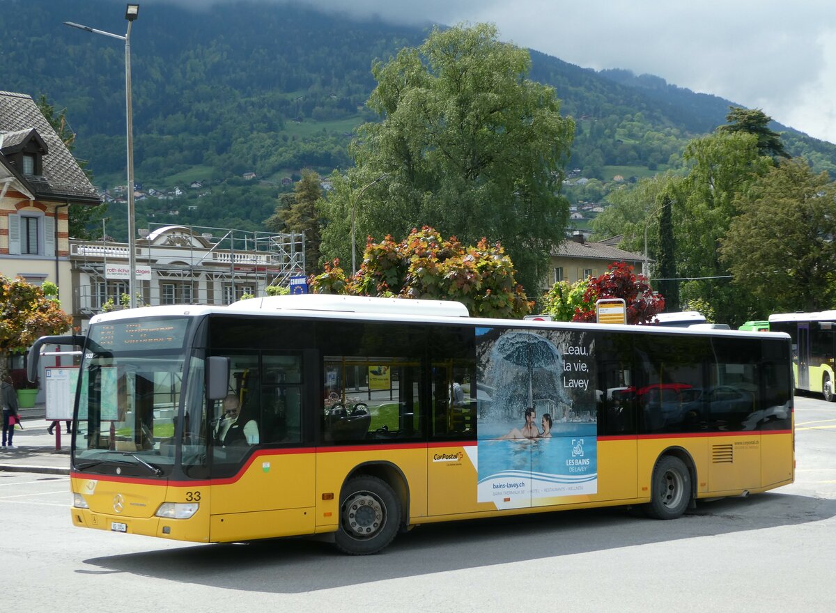 (249'974) - MOB Montreux - Nr. 33/VD 1054/PID 5420 - Mercedes am 13. Mai 2023 beim Bahnhof Monthey CFF