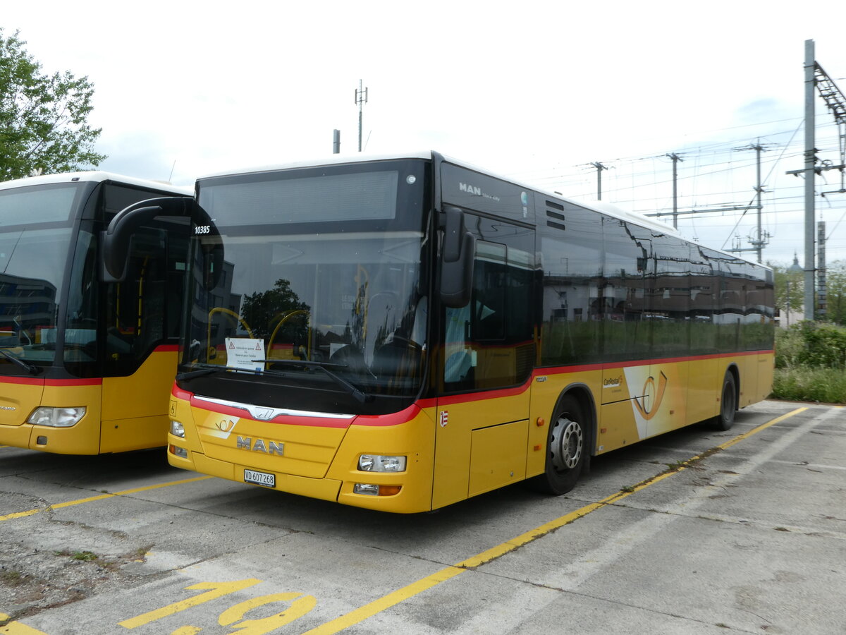 (250'178) - CarPostal Ouest - VD 607'268/PID 10'385 - MAN (ex JU 52'241; ex Nr. 60) am 18. Mai 2023 in Yverdon, Garage