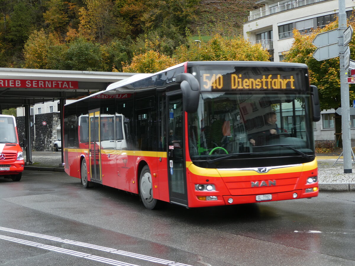 (256'607) - AS Engi - Nr. 2/GL 7702 - MAN (ex Gessert, D-Finsterbergen; ex Herrmann, D-Schnau vor dem Walde) am 31. Oktober 2023 beim Bahnhof Schwanden