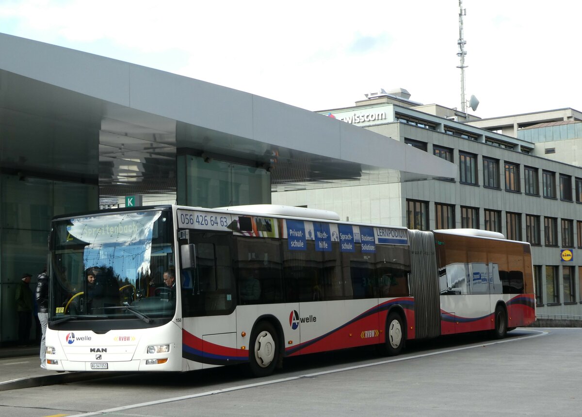 (256'769) - RVBW Wettingen - Nr. 158/AG 347'051 - MAN am 6. November 2023 beim Bahnhof Baden