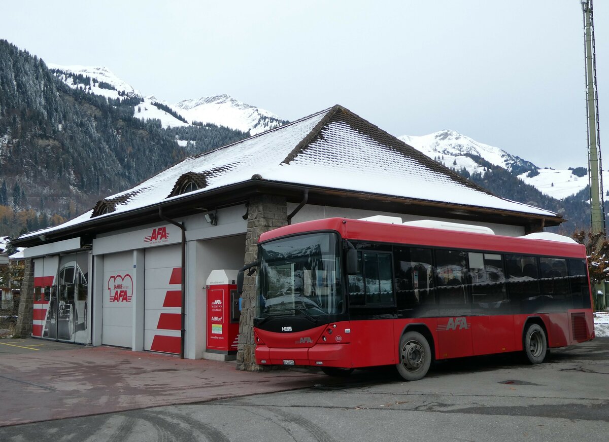 (257'268) - AFA Adelboden - Nr. 59/BE 645'415 - Scania/Hess am 27. November 2023 beim Bahnhof Frutigen