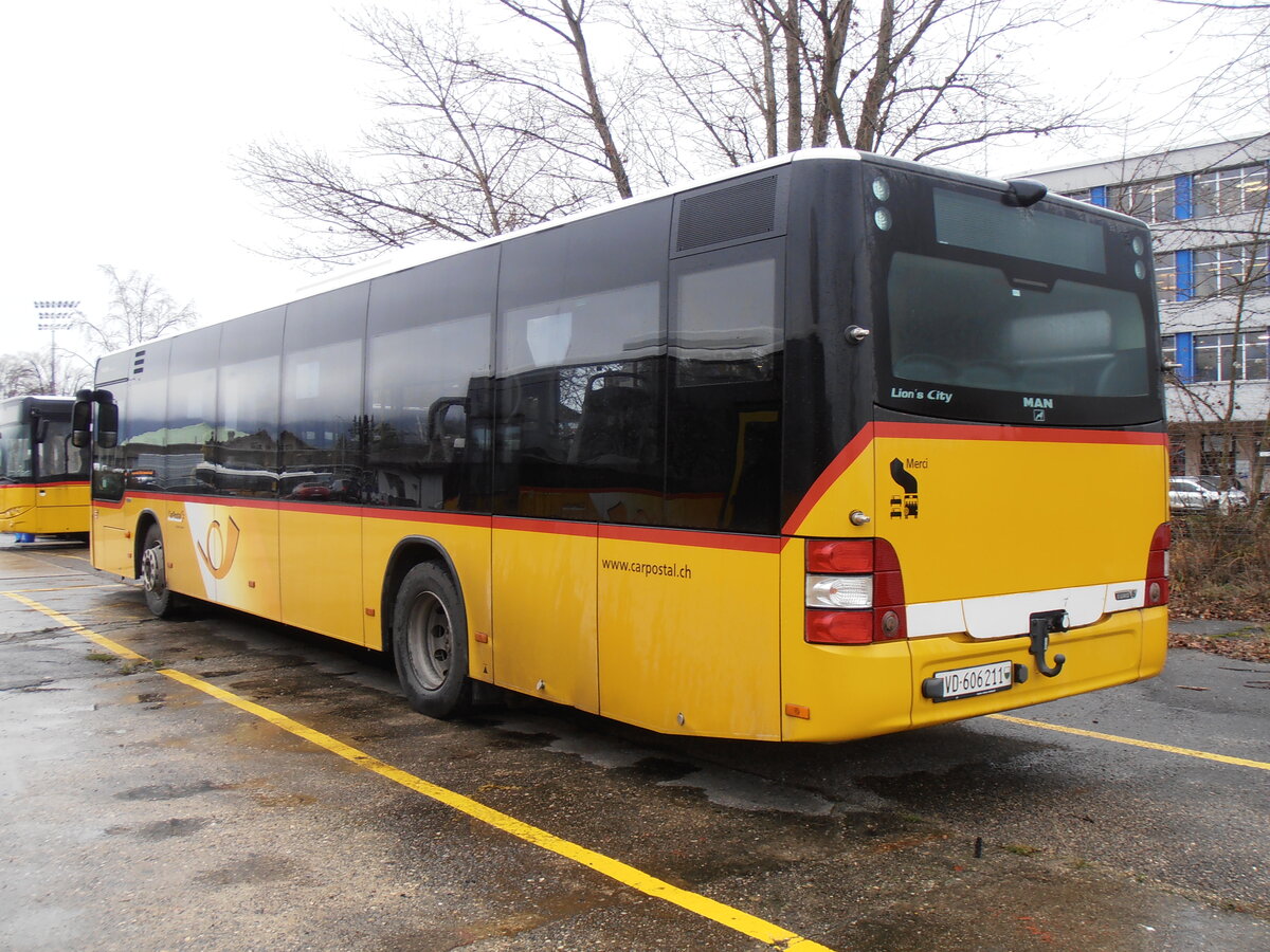 (257'789) - CarPostal Ouest - VD 606'211/PID 10'262 - MAN (ex JU 51'287; ex Nr. 22) am 21. Dezember 2023 in Yverdon, Garage